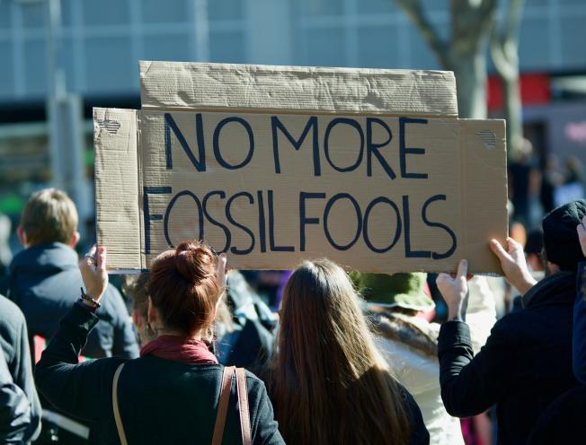 Fossil Fuels sign at climate change protest