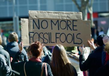 Fossil Fuels sign at climate change protest