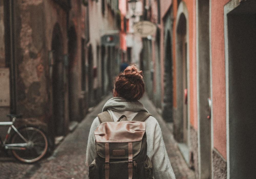 Traveller walking through streets abroad