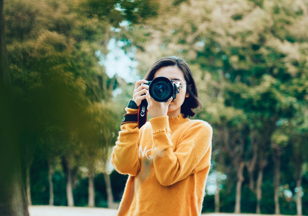 meisje neemt foto / Unsplash