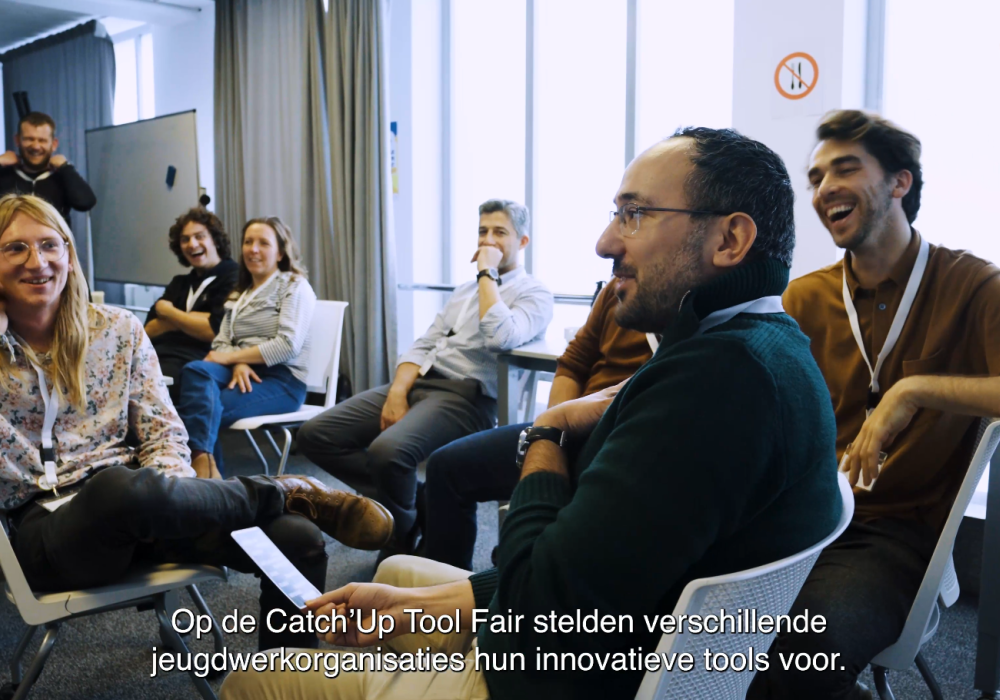 Lachende deelnemers op de Catch'Up