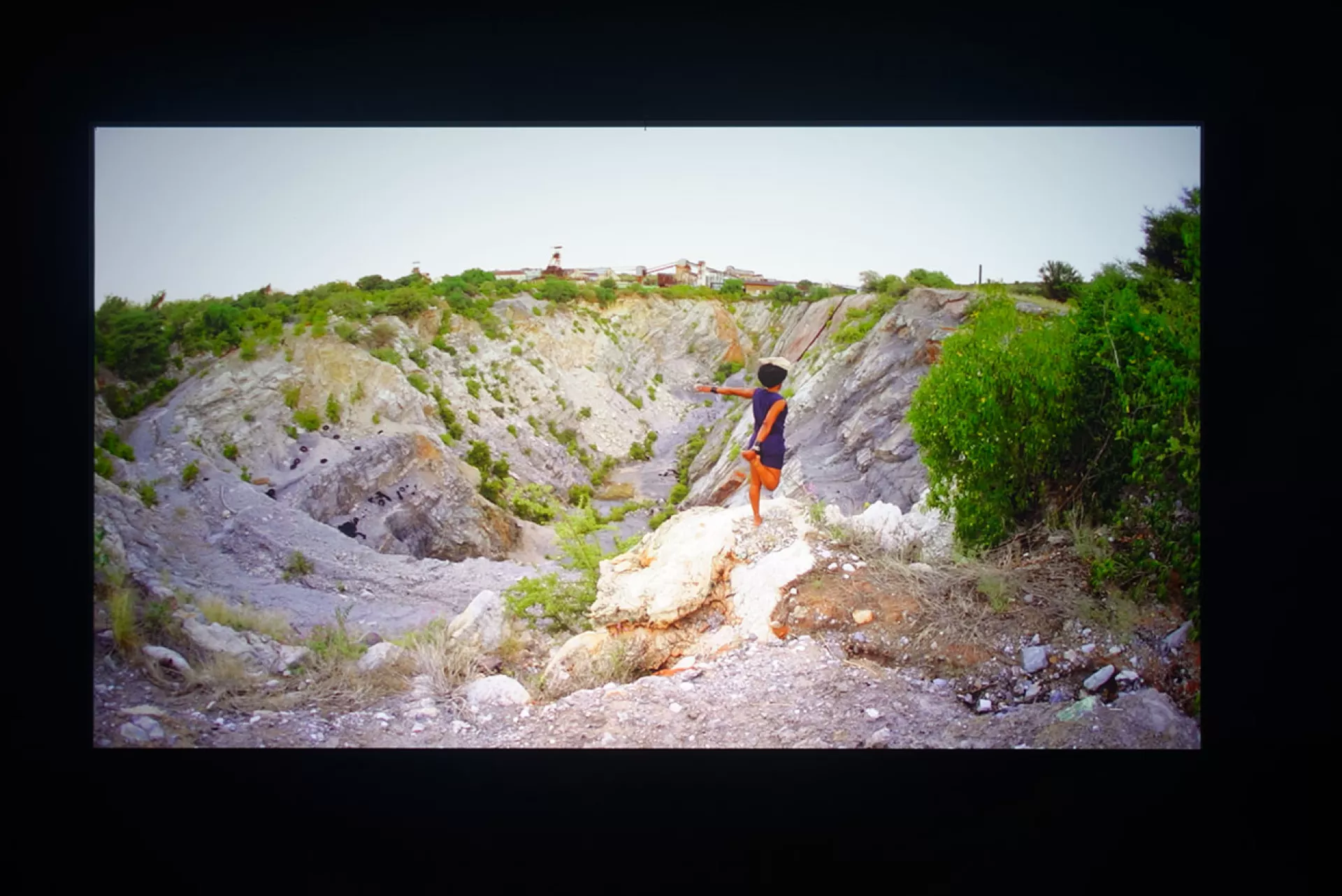 Otobong Nkanga, Remains of the Green Hill, 2015, video still, 5’48’’, exhibition view of “Comot Your Eyes Make I Borrow You Mine” at Kadist, Paris, photo: Aurélien Mole and courtesy of the artist Otobong Nkanga, Remains of the Green Hill, 2015, video still, 5’48’’, exhibition view of “Comot Your Eyes Make I Borrow You Mine” at Kadist, Paris, photo: Aurélien Mole and courtesy of the artist