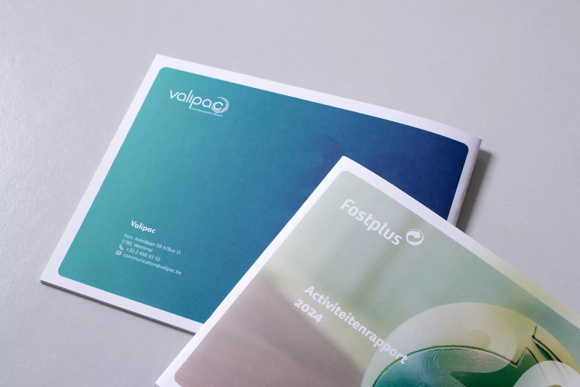 covers twee jaarverslagen Fostplus en Valipac